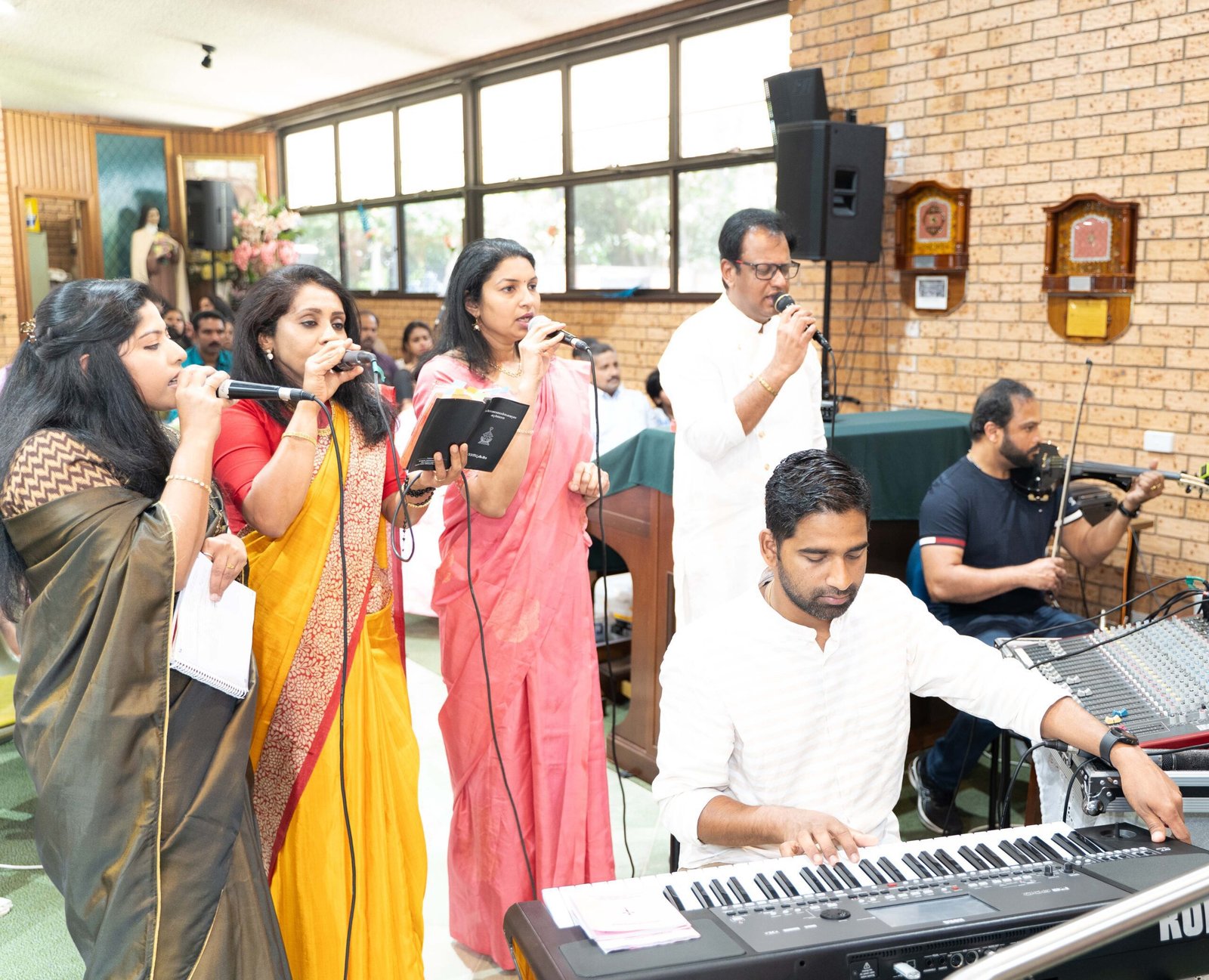 Music Ministry singers and musicians leading worship at St Mary’s